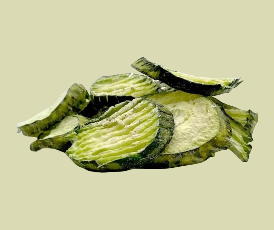 cucumber slices with pale green background